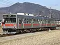 「MISSION「別所線に乗車せよ」」の広告ラッピングが施された1001編成(2019年1月) 2019年2月下旬までこのラッピングを纏い運用。