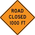 Road is closed 1000 ft. ahead