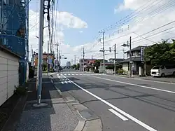 松原二・三丁目道路(清住町通り)の左側が二丁目、右側が三丁目