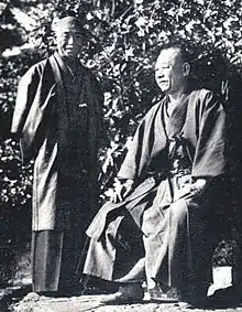 松尾伝蔵(右)と岡田啓介(左)、1934年(昭和9年)