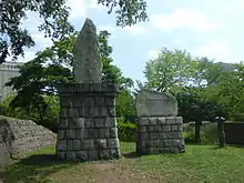 「四翁表功之碑」。開拓功労者の大岡助右衛門・水原寅蔵・石川正蔵・対馬嘉三郎を顕彰したもの(2015年)