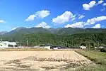 山麓の下呂市宮地から望む白草山（2014年10月18日）