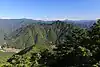 天狗倉山から望む高丸山と南山麓の銚子川、遠景は大台ヶ原山などの台高山脈の山並み(2015年9月19日)