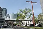 名古屋高速都心環状線と名駅の超高層ビル群を望む（西方向）。（中村区名駅、2016年（平成28年）4月）