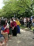 ファンに囲まれながら退場する武将隊正面から信長・秀吉・家康・利家（2011年（平成23年）9月）
