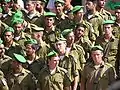 ベレーを着用するイスラエル国防軍兵士。黄緑色の布地はナハル歩兵旅団を示す。