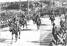 日中戦争（南京攻略戦）における軍旗（右上端）。入城式（閲兵式）にて