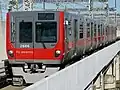 開業時の1000系をイメージしたレッド塗装の06編成