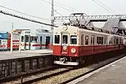 7次車モ6261灯式の大型ヘッドライトが特徴。写真は冷房化改造された姿。登場時は非冷房だった。行き先表示は3次車までは看板式、4次車から手動式の行き先幕となった。（1975年 - 79年ごろ、西鉄小郡駅にて）