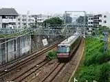 町田 - 相模大野間の切り通しを走る30000形「EXE」（2009年6月19日）
