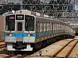 地下鉄千代田線と直通運転する運用に入っていた頃の1000形運行番号を表示している（2005年9月16日 / 喜多見駅）