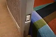 座席の肘掛下にあるAC100Vのコンセント