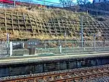 酒樽を模した越乃Shu＊Kuraの駅名標
