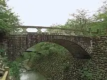 西山ダムに移設復元された江戸期架設の旧高麗橋(長崎市指定有形文化財)