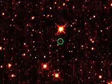 WISEが写した小惑星2010 TK7(緑で囲まれた部分)