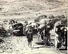 徒歩で退避するパレスチナ難民（1948年）。