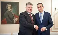ウクライナのペトロ・ポロシェンコと(2018年、ミュンヘン)