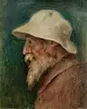 『白い帽子の自画像（フランス語版）』1910年。油彩、キャンバス、42 × 33 cm。個人蔵。