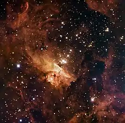 散光星雲NGC 6357領域の画像。中央の星団中で最も明るい恒星がピスミス24-1。出典: ESO / IDA / Danish 1.5 m / R. Gendler, U.G. Jørgensen, J. Skottfelt, K. Harpsøe
