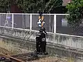 発条転てつ器標識