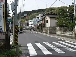 日連入口交差点(終点)。左が起点方面