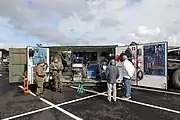 コンテナの機能や構造を最大限に生かし、2015年セキュリティ展示会で出展された、フィンランド軍のモバイル ワーク ショップ。