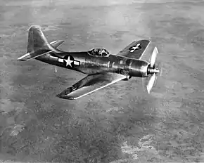 飛行するXF8B-1 57984号機(撮影年不詳)