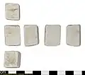 6方向から撮影した石灰岩製テッセラ。長さ25.5mm×18.4mm×15.7mm、重さ17.61g。イギリス・グレーター・ロンドン、43年-402年。