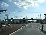 久喜市高柳交差点（旧国道125号との交差点。左折方向が県道さいたま栗橋線）