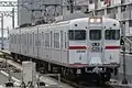 前面細帯復刻後の3000編成（西新町駅）