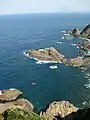 海上に薩摩半島の開聞岳