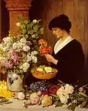 「花を生ける女性」