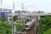 阪和自動車道をくぐり、和泉中央へ向かう準急行（光明池 - 和泉中央）