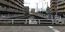 汐入川(上新開橋、原一丁目交差点付近、左:昭代、右:原)