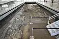 駿府城内の調査で検出された戦国時代末の道路遺構面(静岡市歴史博物館の屋内展示)。