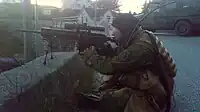 マークスマンライフル仕様のHK417を構えるノルウェー郷土防衛隊の狙撃隊員