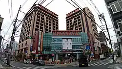 祖原(早良街道より西新テングッドシティを臨む)