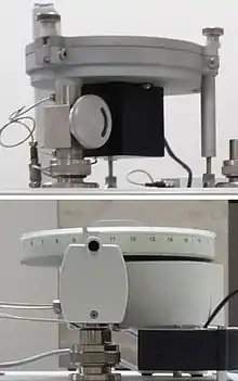 Two different autosamplers for solids. Both consist of motorized carousels.
