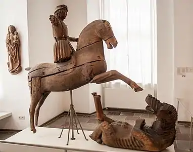 木彫像。ゴットルプ城(英語版)所蔵(1500年頃)