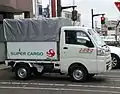 パネル幌車：常温品の輸送、屋根高さ調整可能。（スバル・サンバー）