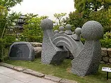 池田城跡公園に設置された朝ドラ「てるてる家族」の記念碑、「てるてる坊主の照子さん文学碑」(通称「てるてる記念碑」)