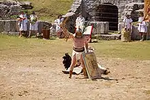 勝利を宣言する剣闘士(カルヌントゥムのイベント)。