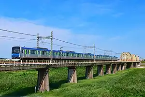 江戸川を渡る60000系電車(2020年8月 川間駅 - 南桜井駅間)