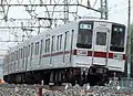 10030型クハ11431。新製当時は密着自動連結器・ジャンパ栓を装備していた(1988年 西新井駅付近)