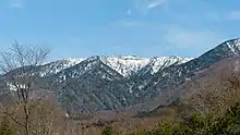 鹿又岳周辺。西側の日光市横川(国道121号沿線)から撮影。