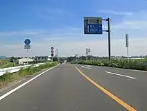 足利市野田町（旧道、2012年9月）川崎橋南交差点から東方向を望む。