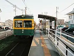 ときめき駅を出発する東関屋駅行きモハ21(1999年4月4日)