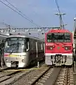 12-000形と並ぶE5003。（2006年10月28日 馬込車両検修場）