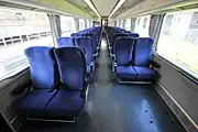 車内全景と車椅子スペース（クハ221）