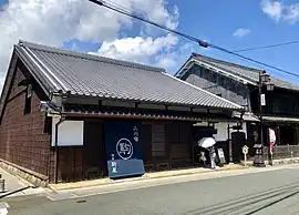商家「駒屋」
